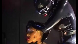 Two sexy lesbians full encased in latex suits have fun in her rubber skins - Part 2