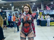 Preview 1 of Naked News reporter doing interviews Body Painted at Exxxotica Miami