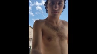 Hairy 20 years old wearing a hat, shirtless on the sun ( teasing for the camera