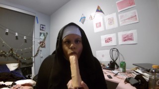 Naughty Nun Sucks Dildo