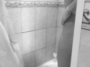 Preview 1 of Slim MILF small tits and big booty washes and pees in the shower.