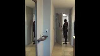 wetsuited orca almost caught at hotel door