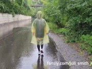 Preview 1 of Teen in yellow raincoat flashes pussy outdoors in the rain