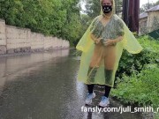 Preview 5 of Teen in yellow raincoat flashes pussy outdoors in the rain