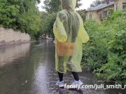 Preview 6 of Teen in yellow raincoat flashes pussy outdoors in the rain