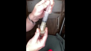 loading a syringe of my thawed cum loads to inject into my wife’s pussy (surprise)