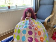 Preview 2 of British milf inflates a giant beachball by mouth