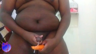 Black fat sissy put a carrot in his ass