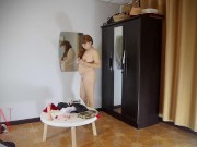 Preview 2 of A naked lady does make-up in front of a mirror, puts on underwear, stockings, a skirt. c3