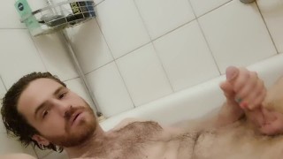 Hot hairy guy got horny in bathtub. Jerking big dick