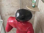 Preview 5 of Rubberdoll showers in red catsuit