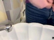 Preview 1 of Guy solo pissing in the sink. The guy urinates in the sink.