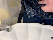 Preview 2 of Guy solo pissing in the sink. The guy urinates in the sink.