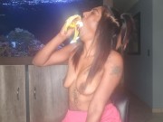 Preview 3 of Topless desi squeezes her boobs as she sucks and deepthroats on a banana