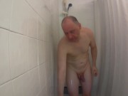 Preview 2 of Kudoslong naked British man in the shower washes he pulls back his foreskin and wanks becoming erect