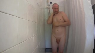Kudoslong naked British man in the shower washes he pulls back his foreskin and wanks becoming erect