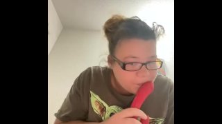 White women sucking sex toy and playing with her boobies