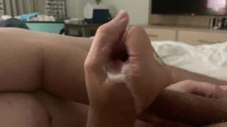 Getting jerked off at a hotel and I cum twice.