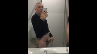 Stroking my erect penis until I climax and ejaculate