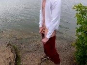 Preview 3 of the guy jerks off his big beautiful dick by the lake