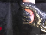 Preview 2 of Milking table closeup: The mistress massages the sperm out of the cock with latex gloves.