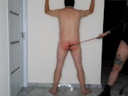 Preview 3 of BDSM session. Dominatrix Nika spanked a slave on bare ass and whipped him on the back