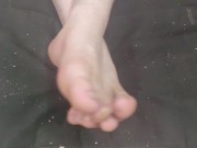 Preview 6 of My feet moving around on the black bed.