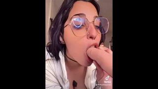 latina girl spits on her big tits, make a titsjob and suck dildo, fingering her pussy and then cum f