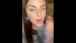 Sexy MILF Smokes a Cigarette while giving an Incredible Blowjob