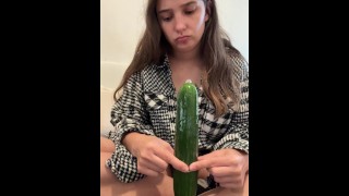 Schoolgirl fucked her tight pussy with a huge cucumber