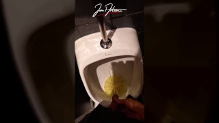 This handsome boy pisses pee in a public urinal in a crowded restaurant. Jon Arteen gay porn video