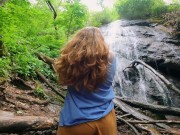 Preview 1 of Hiker give strip tease in front of a beautiful waterfall
