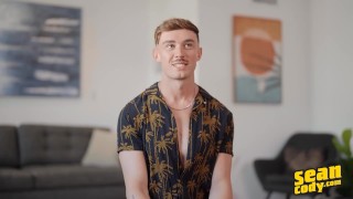 SEAN CODY - Phoenix Sheds His Clothes And Strokes His Long Curved Cock Until He Cums On The Bed