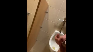 Risky public urinal jerk