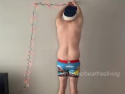 Preview 1 of Straight Bear Sets Up Christmas Lights in Sexy Santa Underwear