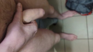 Stripping naked and masturbating in a public bathroom
