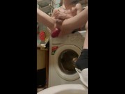 Preview 2 of A young sexy guy sits with his legs spread in his bathroom and plays with his huge anal prolapse
