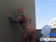 Preview 5 of The legend of muscles and ink: Tattooed giant Rob Diesel, shows his power on the balcony