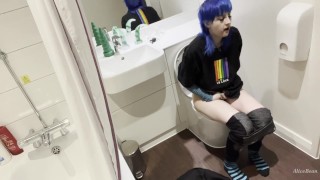 In the public toilet of the bar, she filled the floor with squirt and fucked her mouth with her fist
