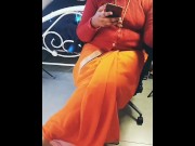 Preview 2 of Low Hip Orange Saree Navel Aunty