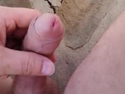 Preview 4 of masturbation handjob on the beach looking at a naked woman walking on a public beach with her tits a
