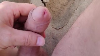 masturbation handjob on the beach looking at a naked woman walking on a public beach with her tits a