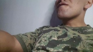 soldier is left alone while his companions went out and he masturbates and cums a huge load on his b