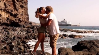 Beautiful Couple in Love Passionately Kissing on a remote island