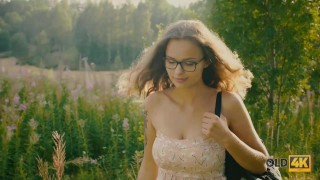 OLD4K. Girl tempts old man and gets it on with him in the greenery