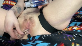 Horny Milf rubs and fucks pussy with glass dildo