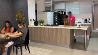 Aisha Fucks her friend in the kitchen while her family is at the table