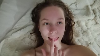Sexy student licks her fingers and touches her boobs