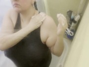 Preview 5 of Showering in a dress: Soaking wet and soapy in a grey dress, hugging every curve