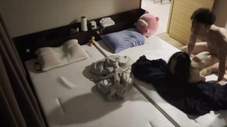 Excited Japanese couple having sex while wearing clothes